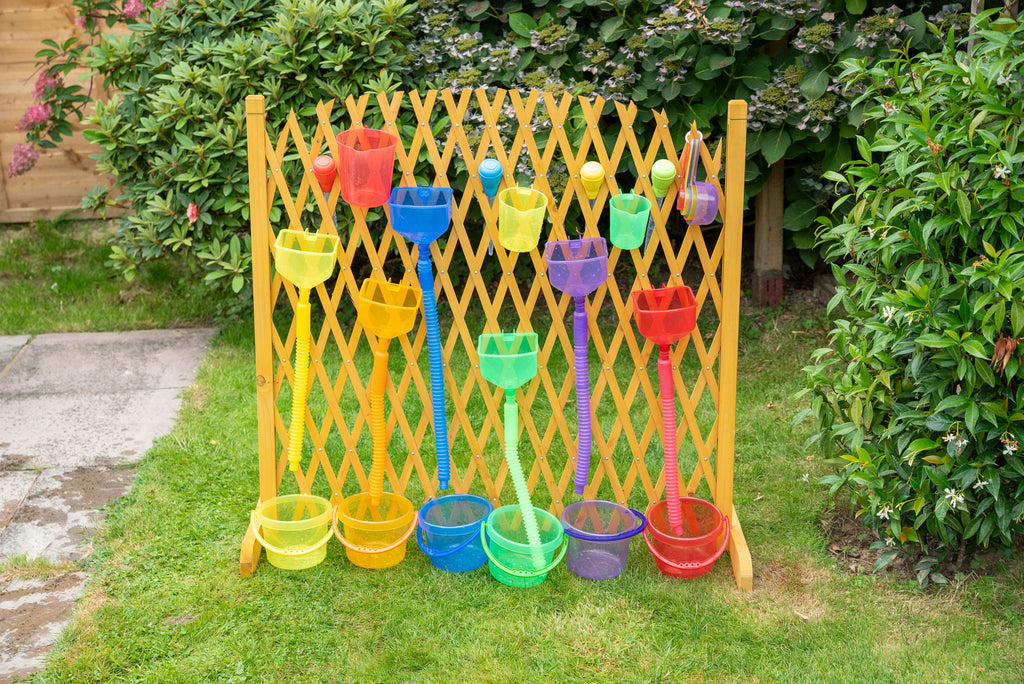 Yellow plastic water play gate with rows of colorful hanging cups