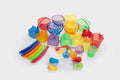Colorful plastic water-and-sand play set with buckets, funnels, and cups