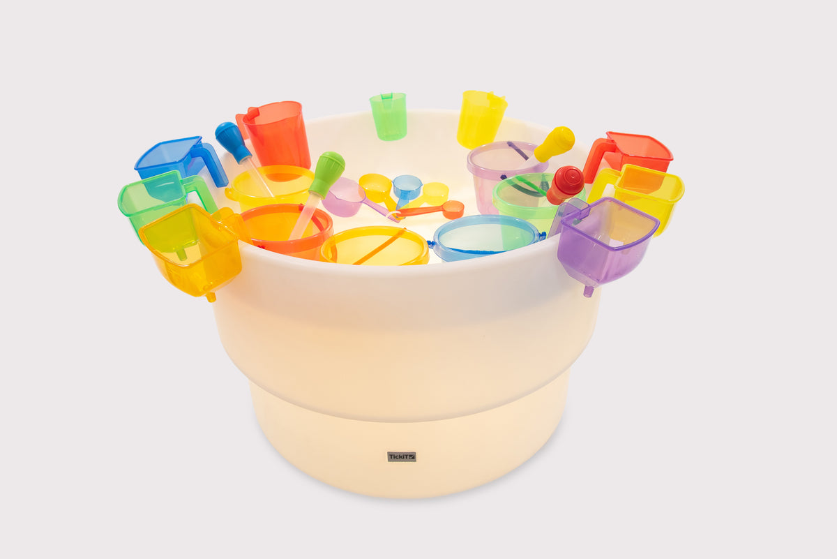 Light round water and sand table with rainbow plastic accessories and cups