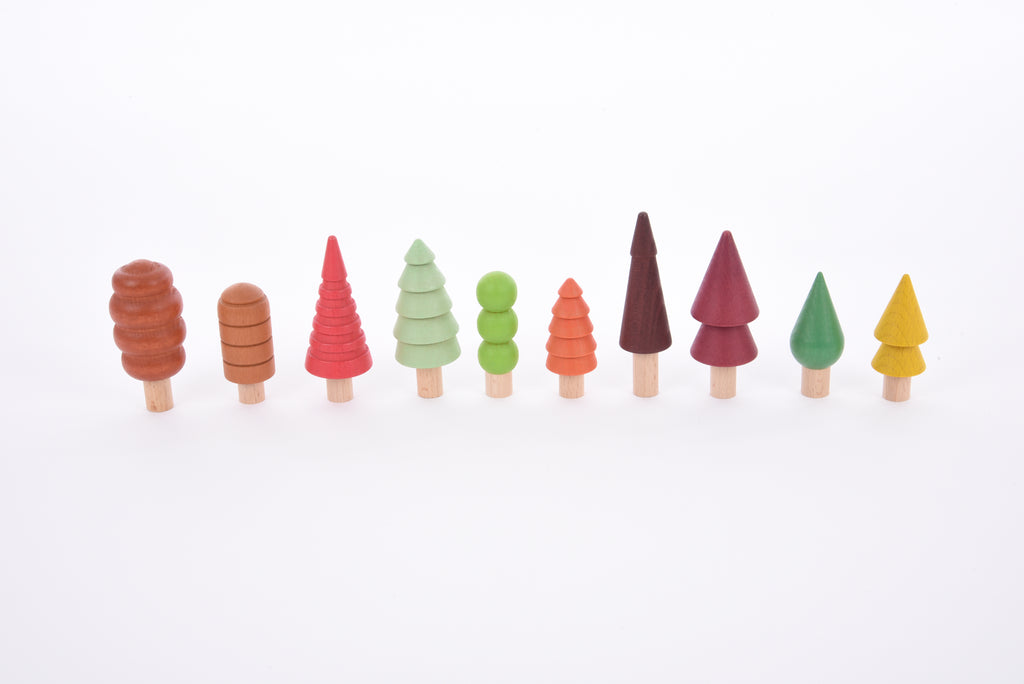 Small multicolor wooden tree figures, assorted shapes and colors