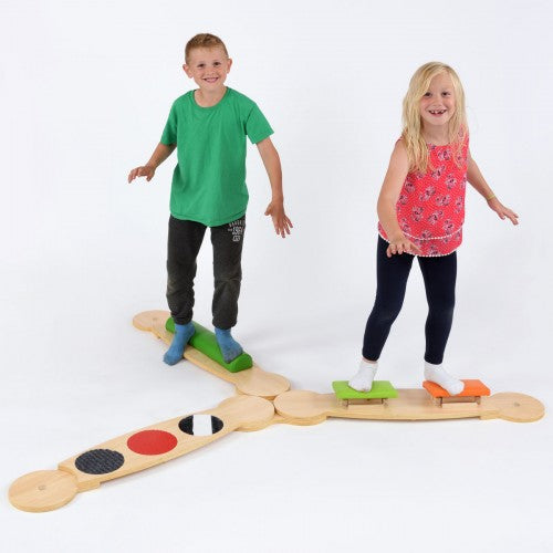 Wooden balance beams set with colorful stepping pads for kids to balance and step
