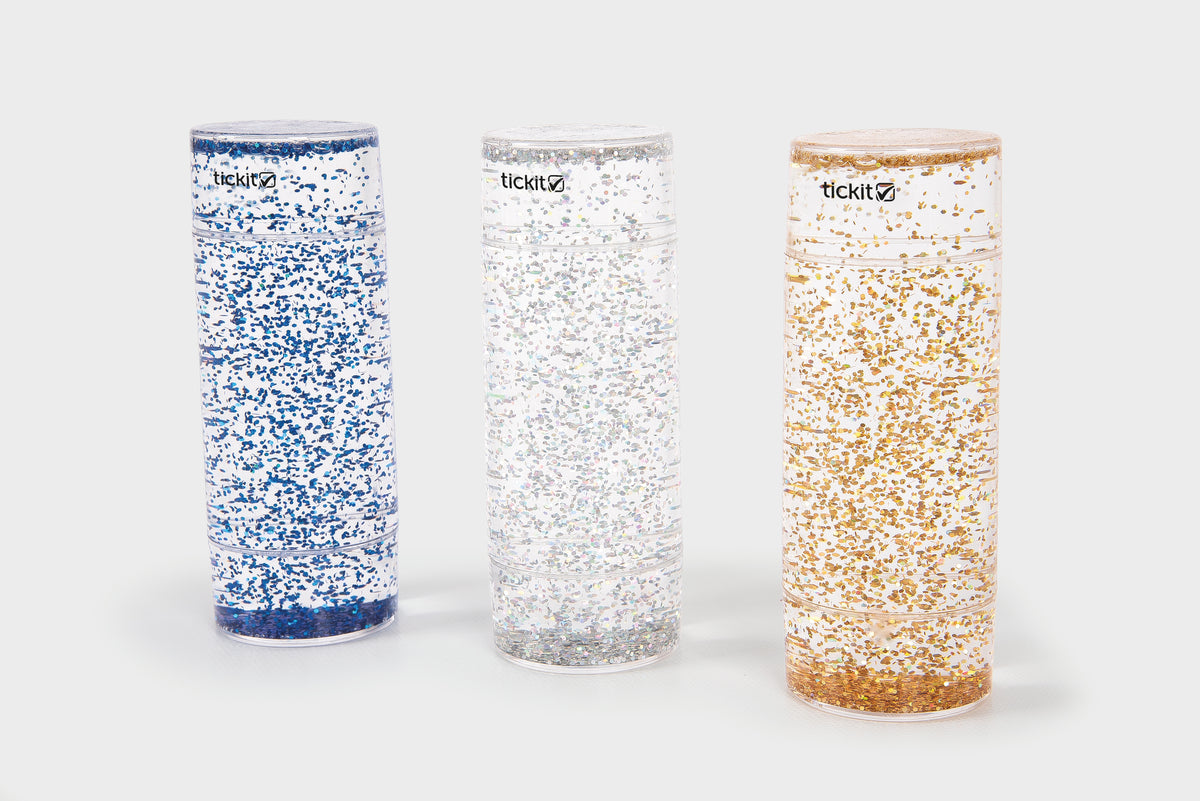 tickit glitter sensory tubes, three cylinders: blue, silver, and gold