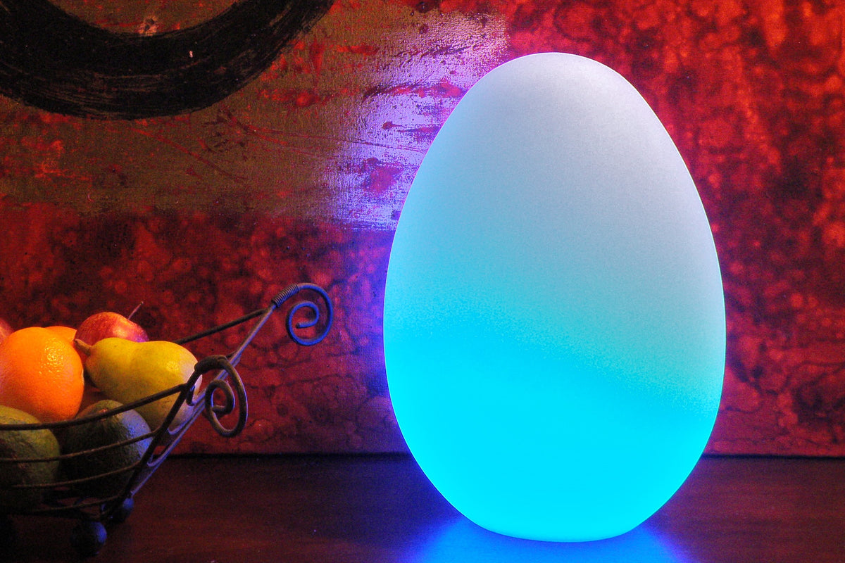 Glowing egg-shaped light, soft blue illumination