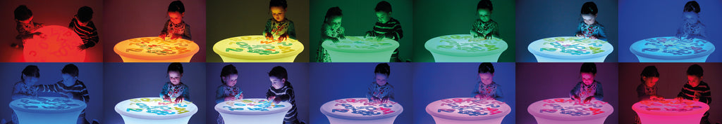 Sensory glow table with a round illuminated top and colorful number and symbol designs