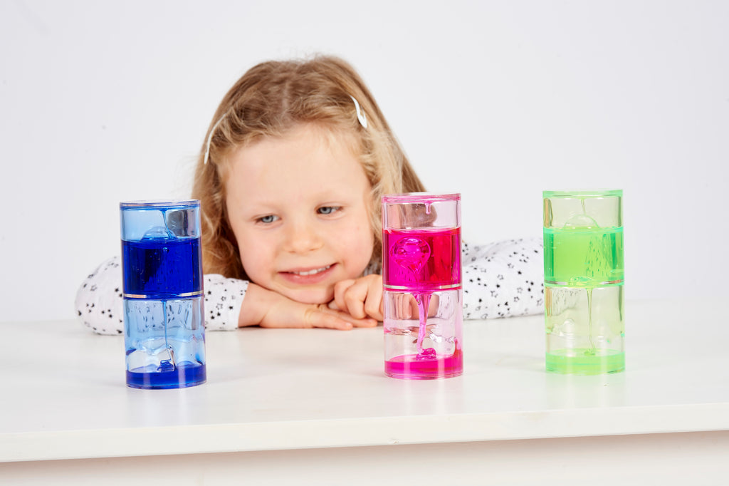 Ooze tube set with three stacked translucent tubes: blue, pink, green