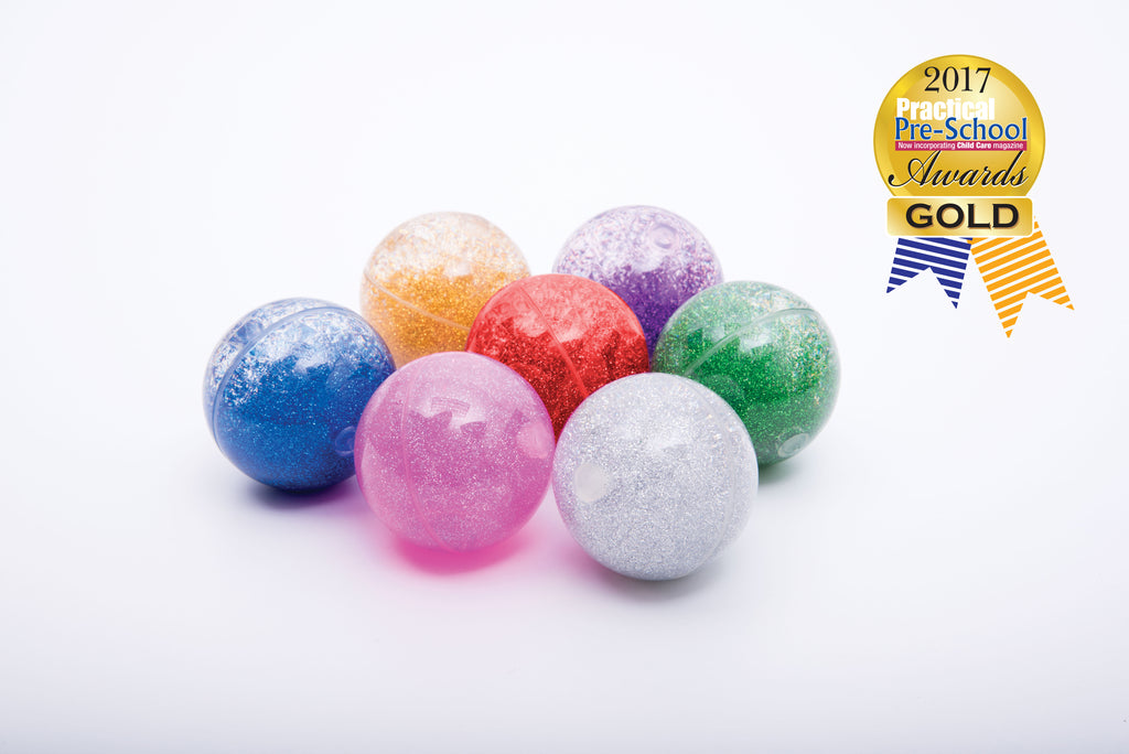 Colorful set of glitter sensory balls in assorted rainbow shades