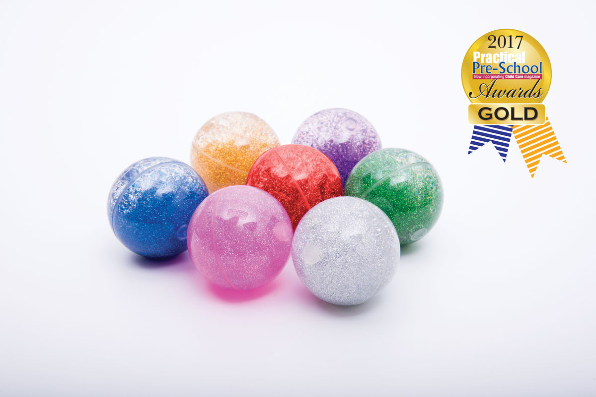 Colorful set of glitter sensory balls in assorted rainbow shades