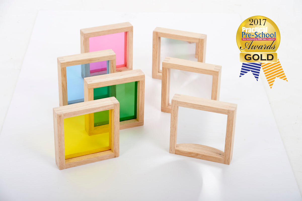 Set of wooden square sensory blocks with colored translucent panels and Gold badge