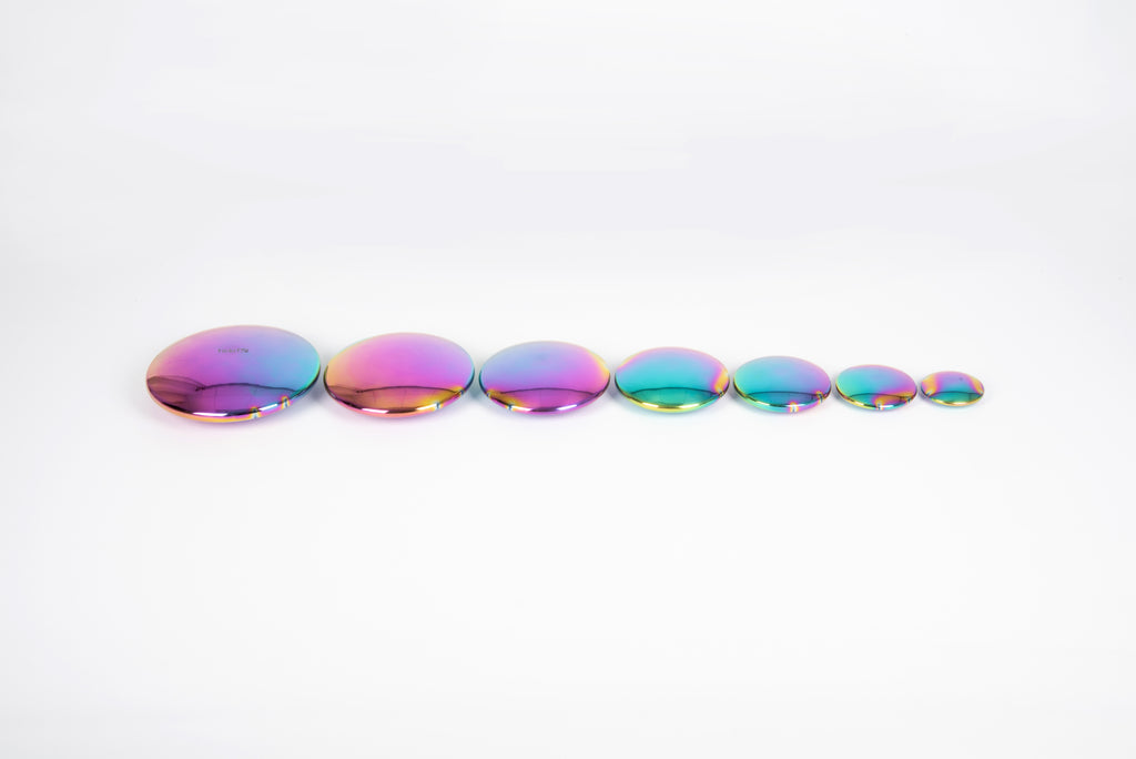 Iridescent rainbow steel buttons set of 7, flat round discs in a line