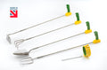 Set of four long-reach garden hand tools with green/yellow grips and metal heads