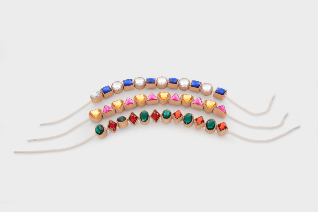 Colorful shape lacing beads set with blue, pink, teal, orange and silver charms