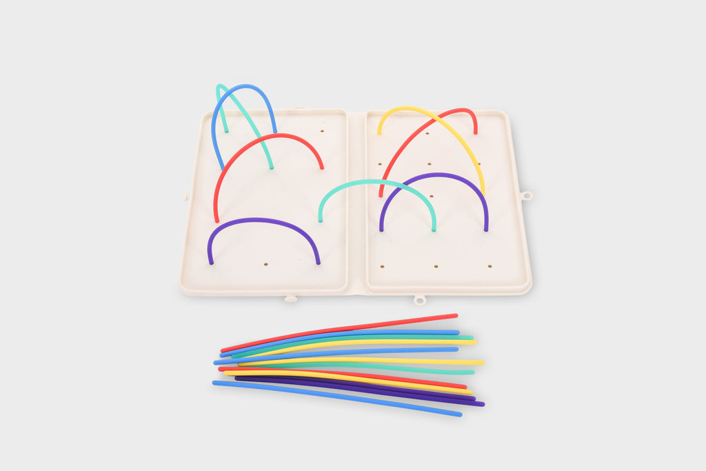 Two beige activity maze inserts with colorful arched routes and rainbow strips
