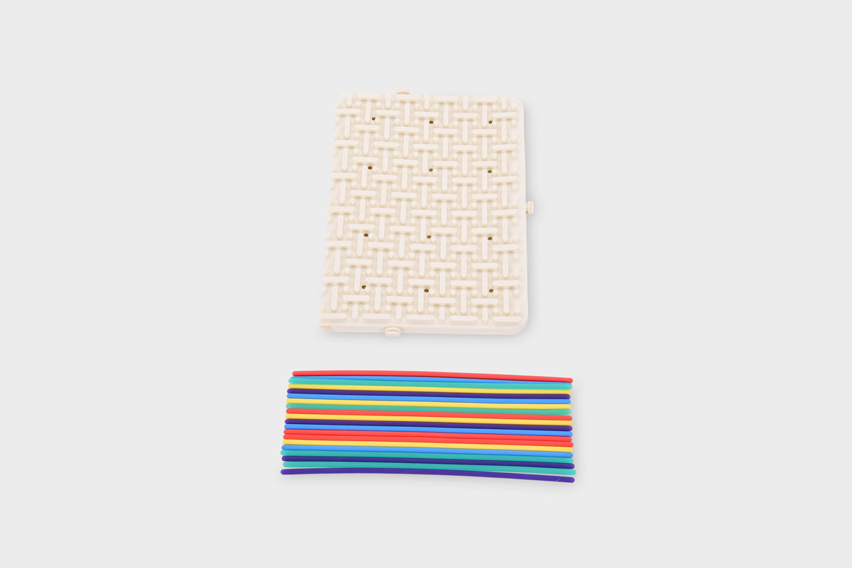 Beige activity maze board with woven maze grid and rainbow strips