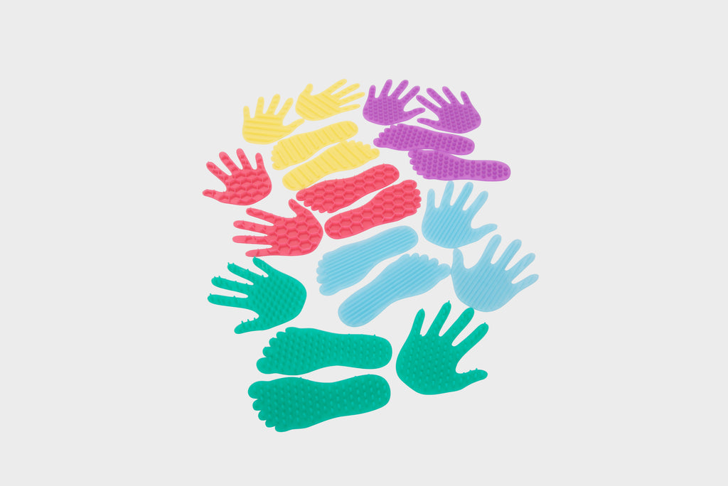 Assorted hand and foot shape stickers, mixed colors in a clustered layout