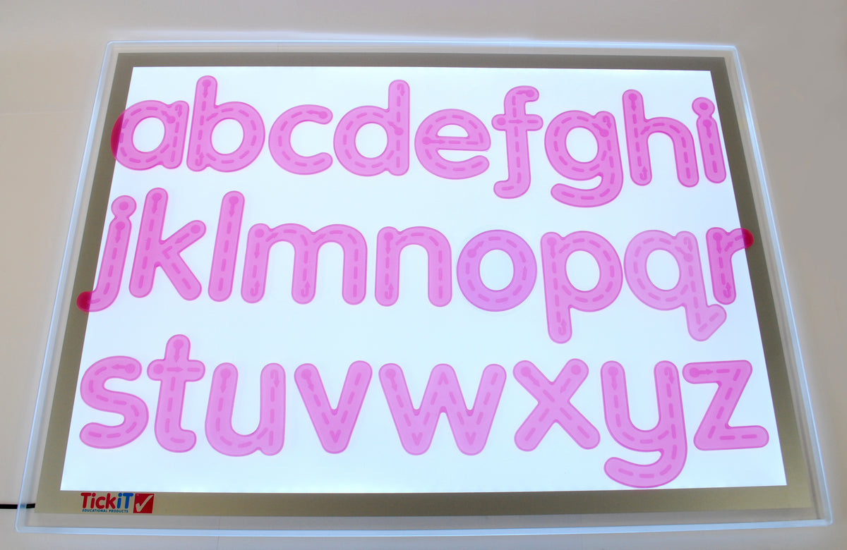 Alphabet tracing board with pink letter shapes A to Z