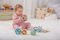 Child playing on a soft mat; yellow trace number pieces not clearly visible