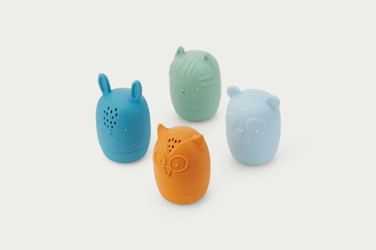 Set of four animal squirter toys in blue, green, orange, and light blue