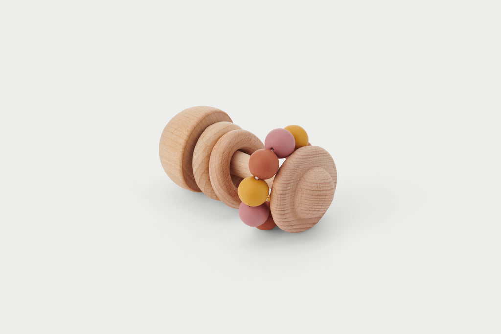 Wooden bead rattle toy with pastel round beads on circular rings
