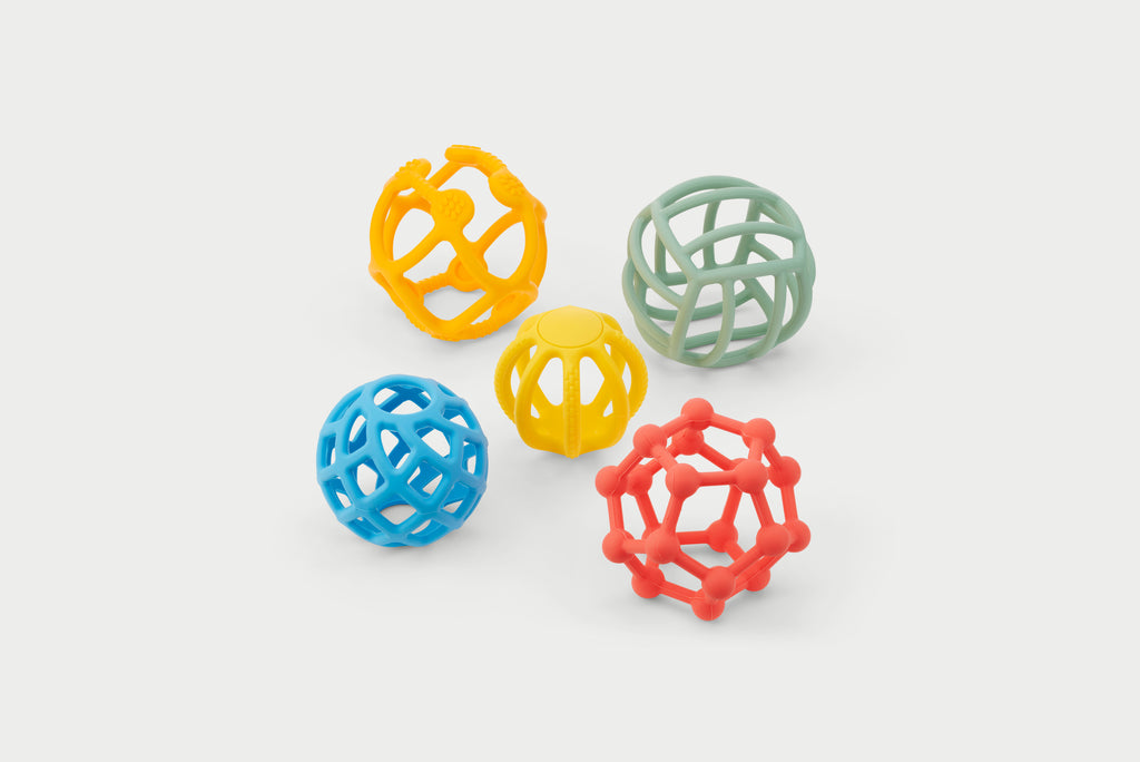 Rainbow flexi ball toy set with orange, yellow, blue, green, and red textured balls