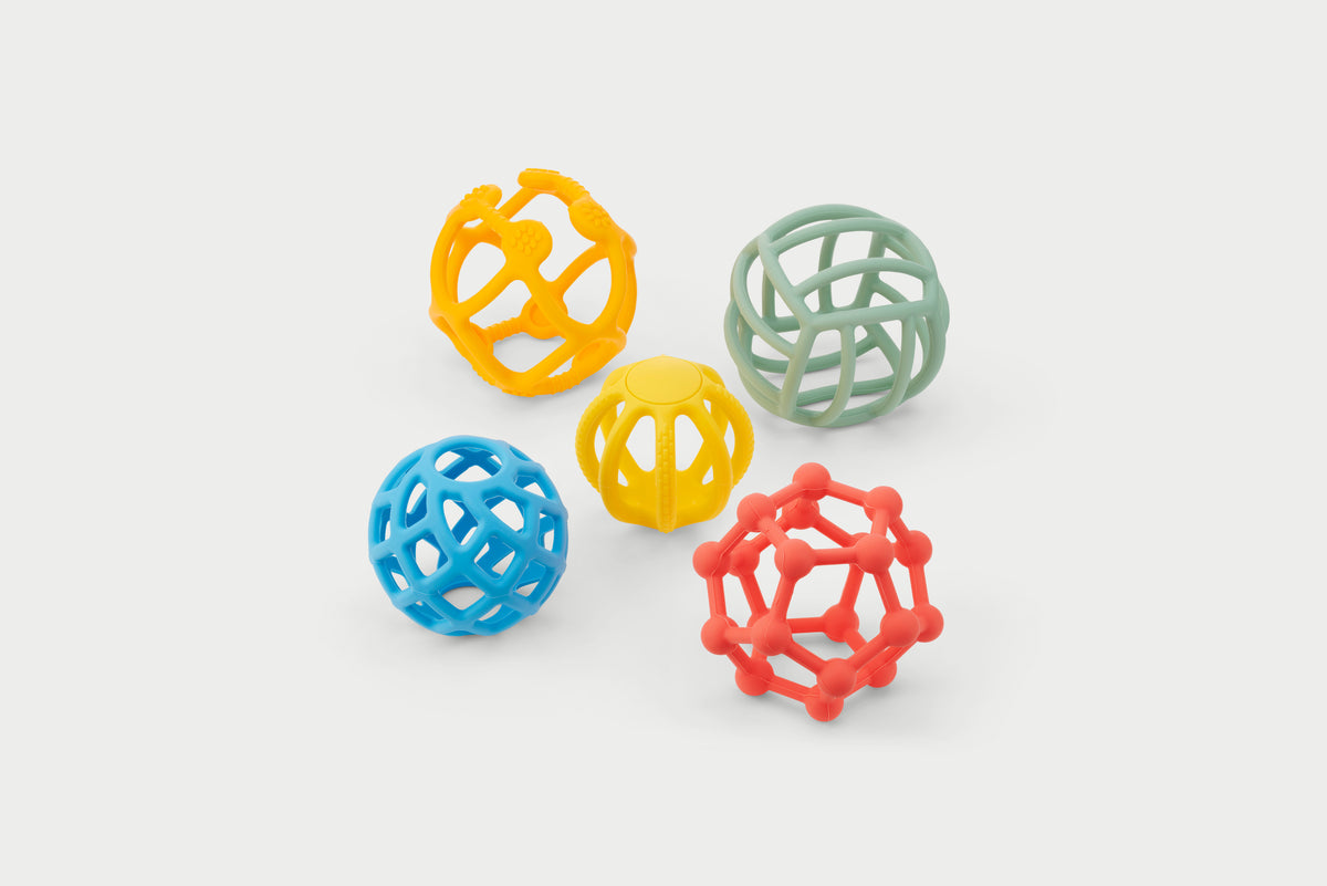 Rainbow flexi ball toy set with orange, yellow, blue, green, and red textured balls