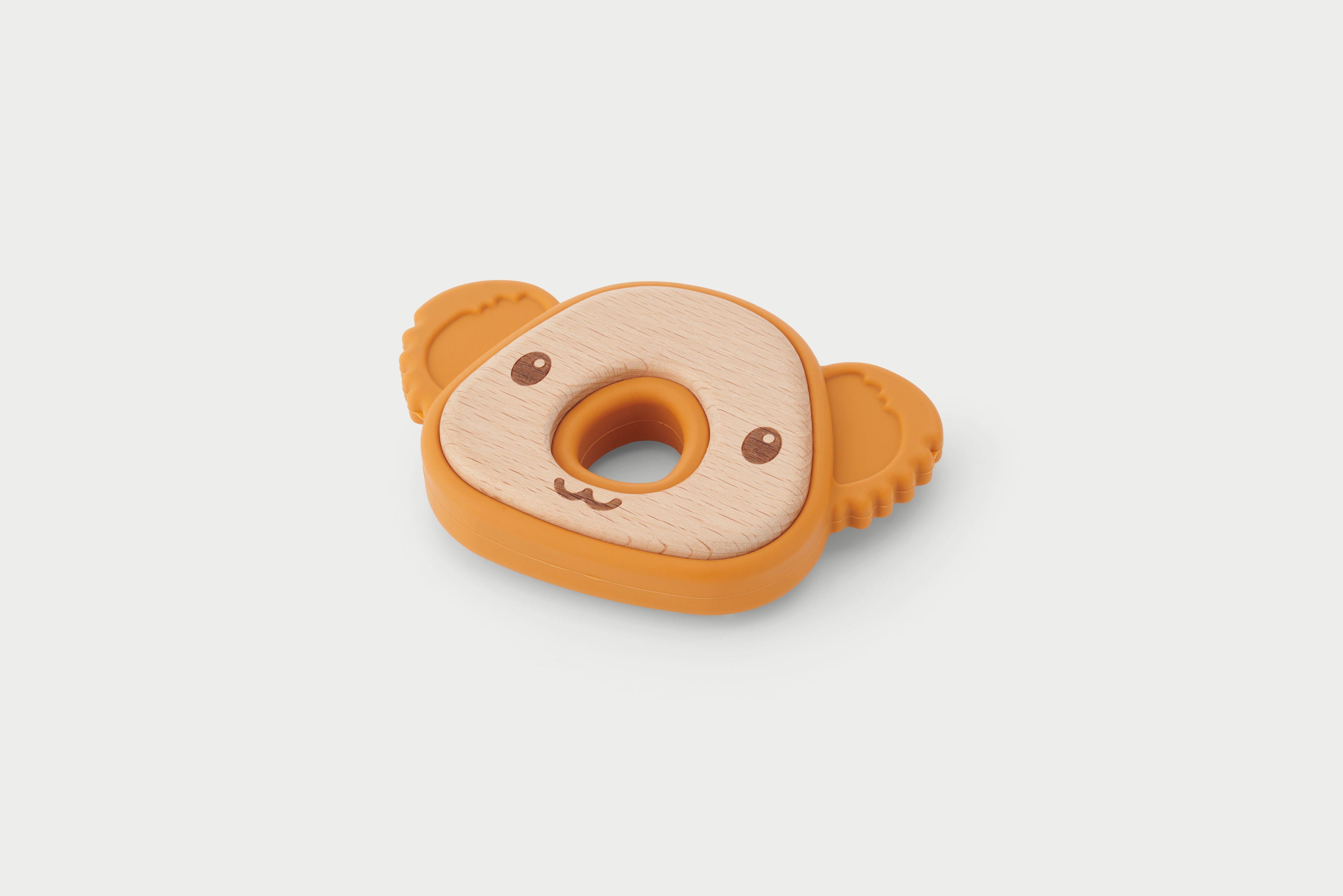 Koala-shaped silicone teether with light fabric insert, round teething ring, and orange grips
