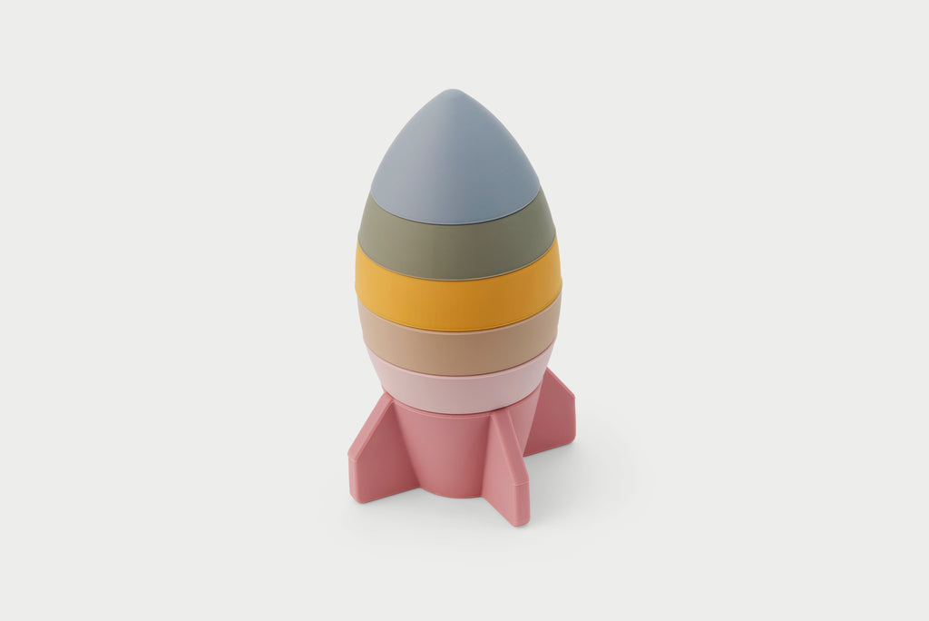 Earth-tone rocket stacker toy with layered cone top and pink base
