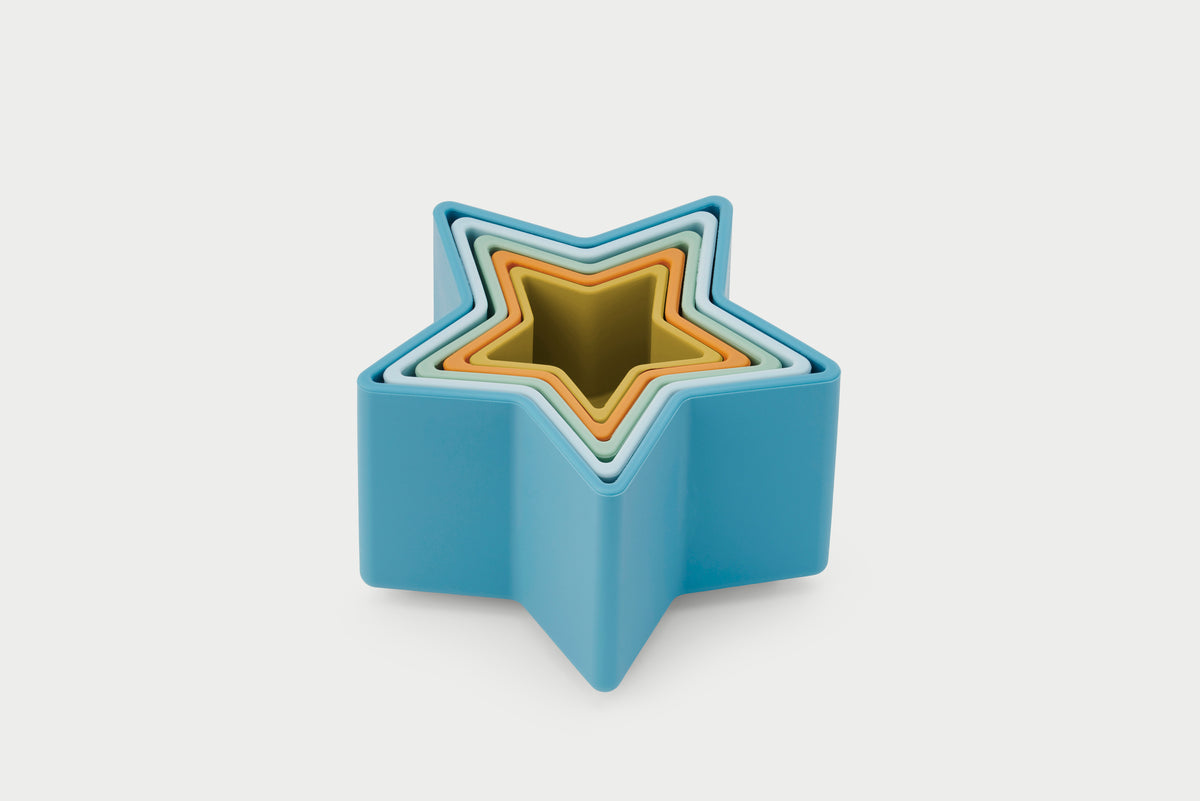 Star stacking cups: nested blue, gold, and light-colored star shapes