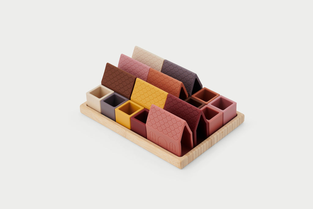 Silisoft Village Blocks Earth set with house-shaped silicone blocks on wooden tray