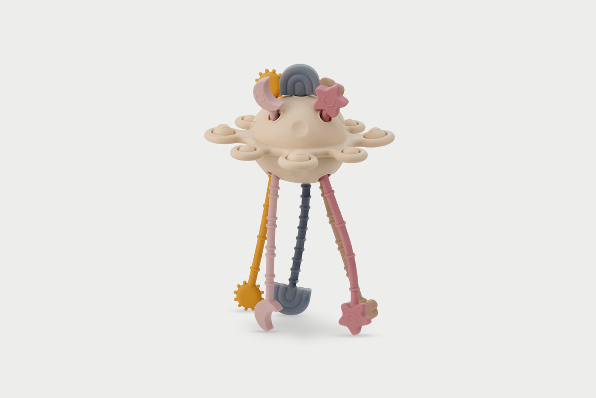 Silisoft zip pull earth toy with planet charm on cream fabric and dangling legs