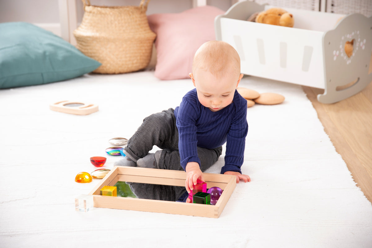 Small wooden mirror tray with mirrored base and multicolor beads and blocks