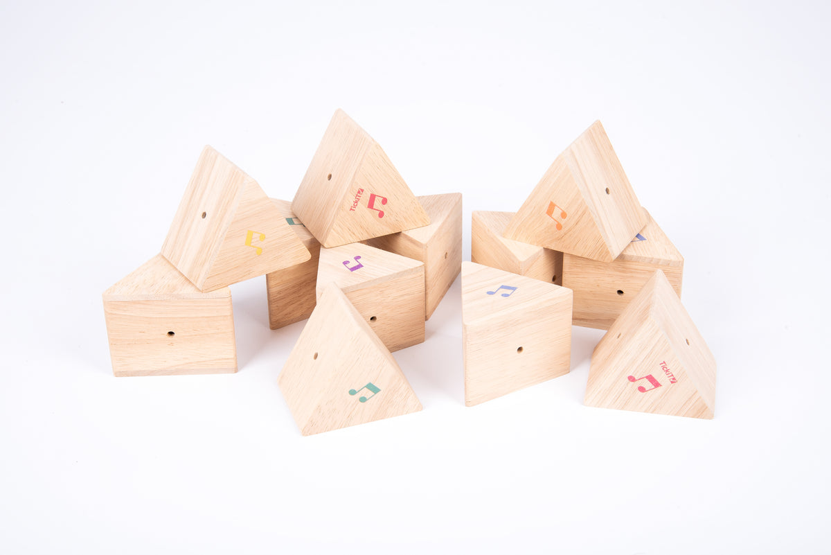 Assorted wooden sound prism triangular blocks with colorful musical note decals