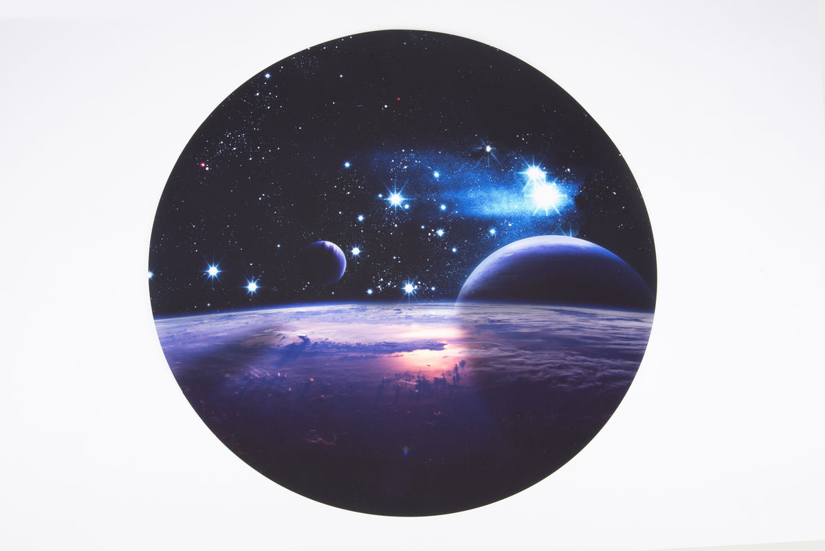 Round space-themed play mat with planet and starry sky graphic