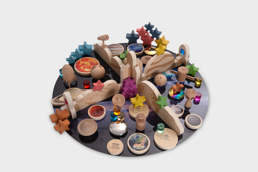Wooden space-themed resource bundle with planets, stars, rockets, and figurines