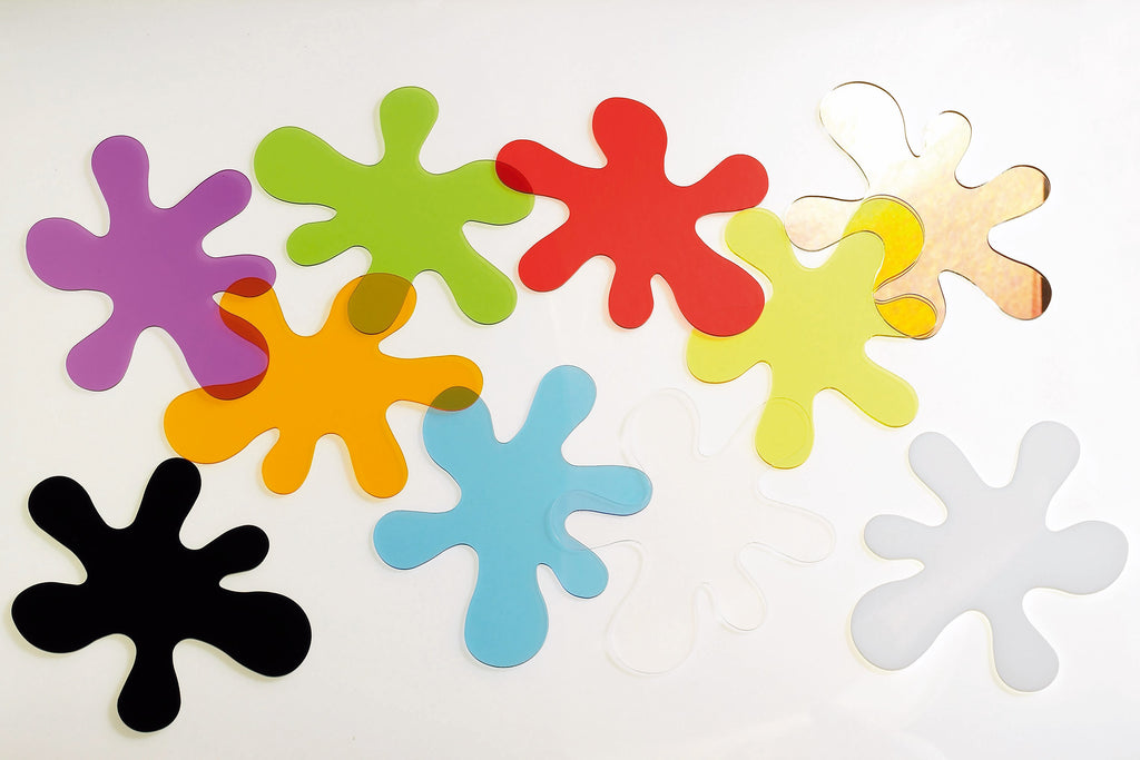 Colorful foam puzzle pieces in star, flower, and splash shapes
