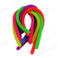 Multicolor stretchy noodle fidgets, stacked coiled loops with tails.