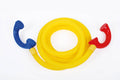 Coiled yellow talking tubes set with blue and red end mouthpieces