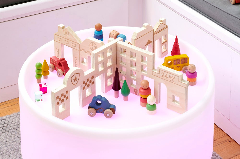 Town discovery dividers play set with wooden buildings, trees, and vehicles on a round base