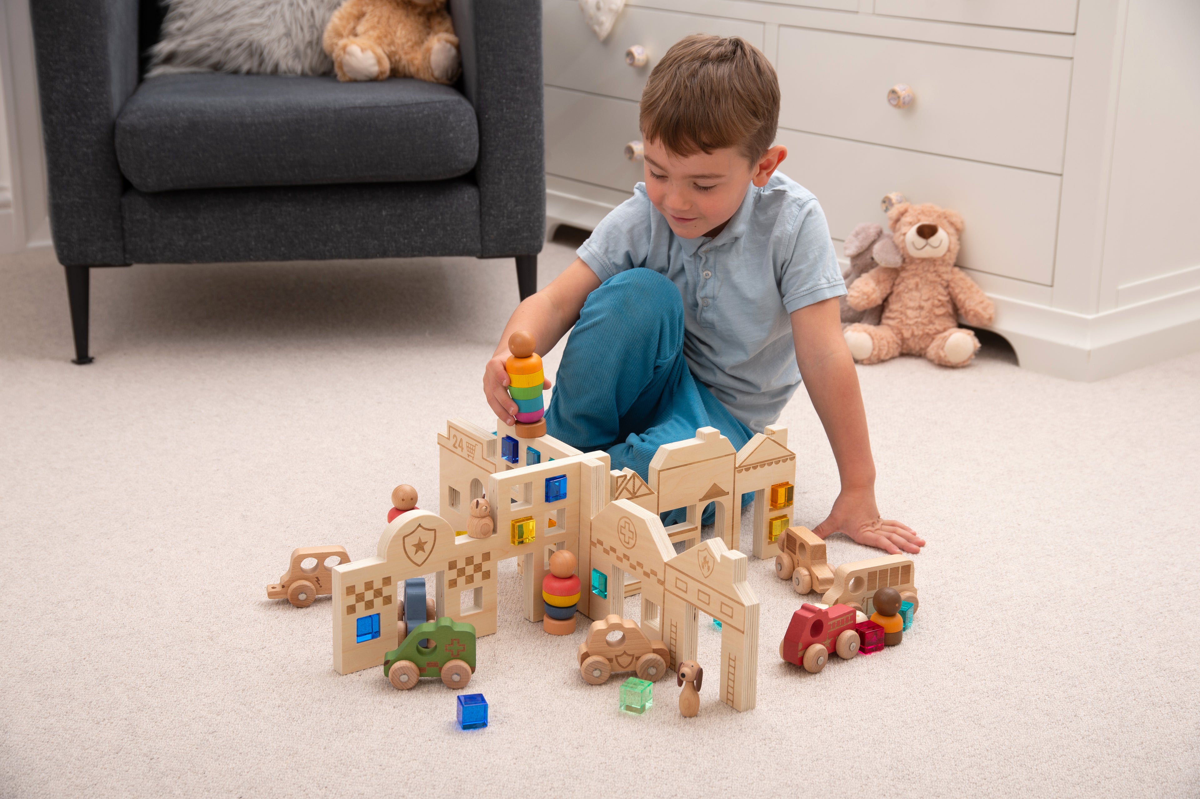 Town discovery dividers set with wooden town buildings and vehicles as a child places pieces
