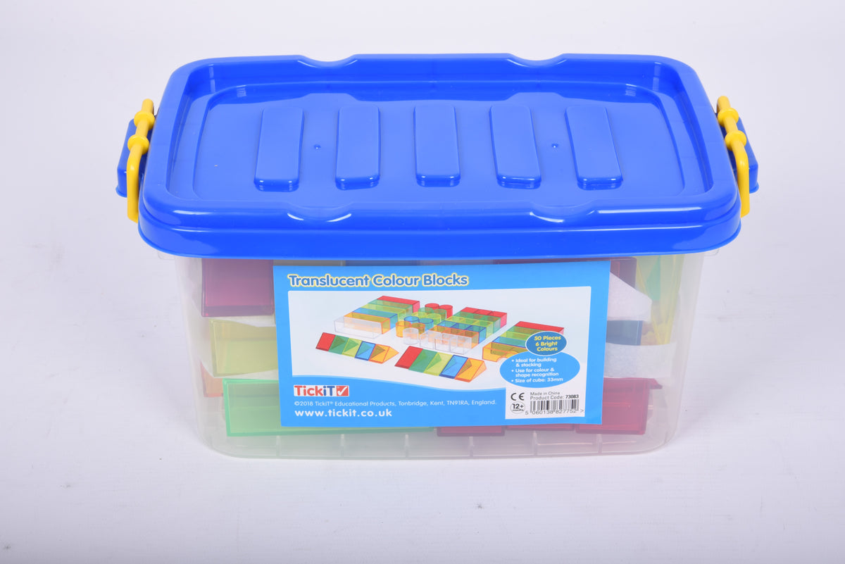 Translucent color blocks in clear plastic container with blue snap-on lid