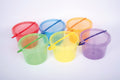 Translucent bucket set with six pastel buckets—yellow, green, blue, purple, red, orange