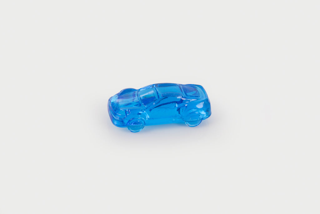 Translucent blue toy car with detailed window and wheel features