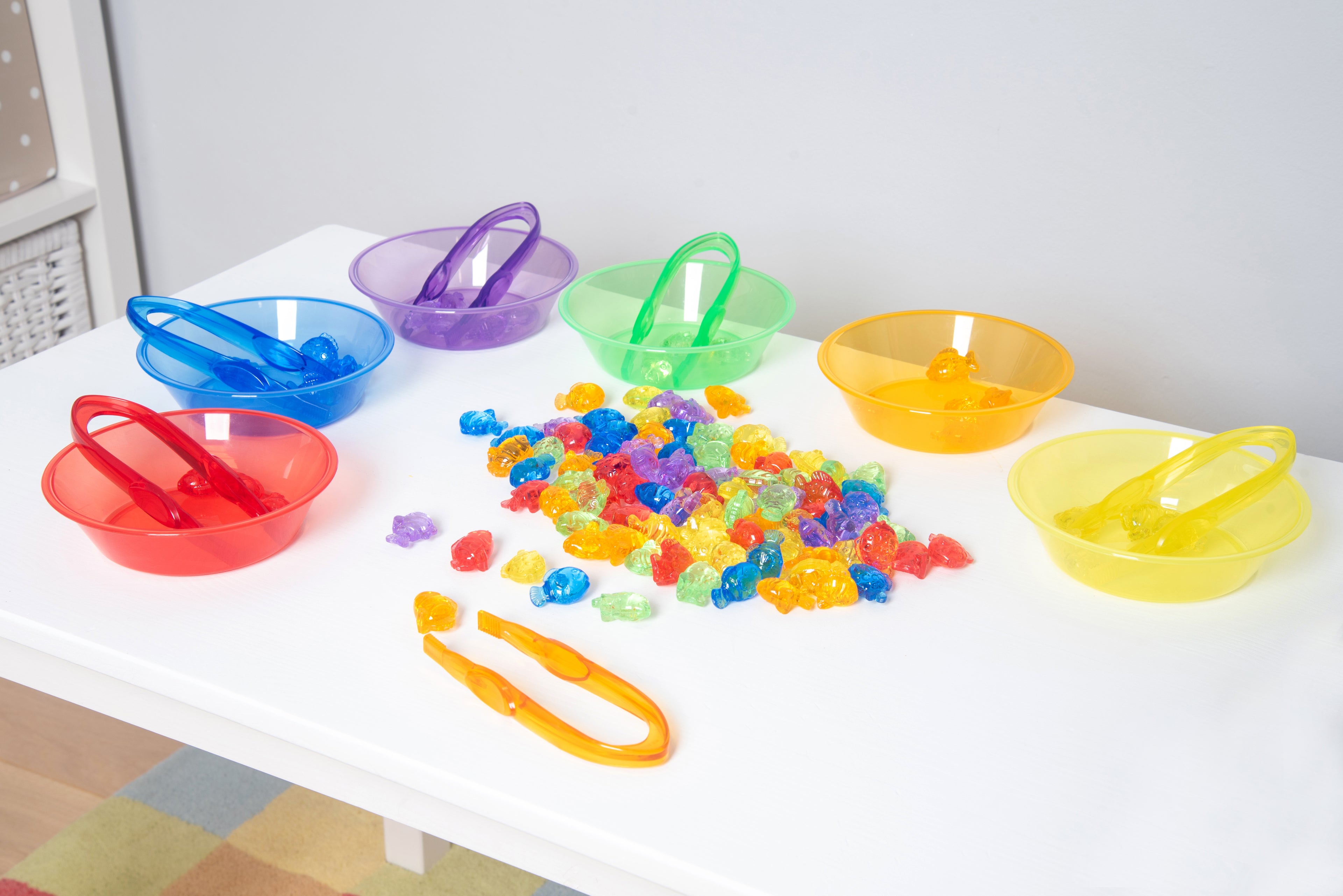 Translucent color fish set with multiple translucent bowls, scoops, and fish pieces