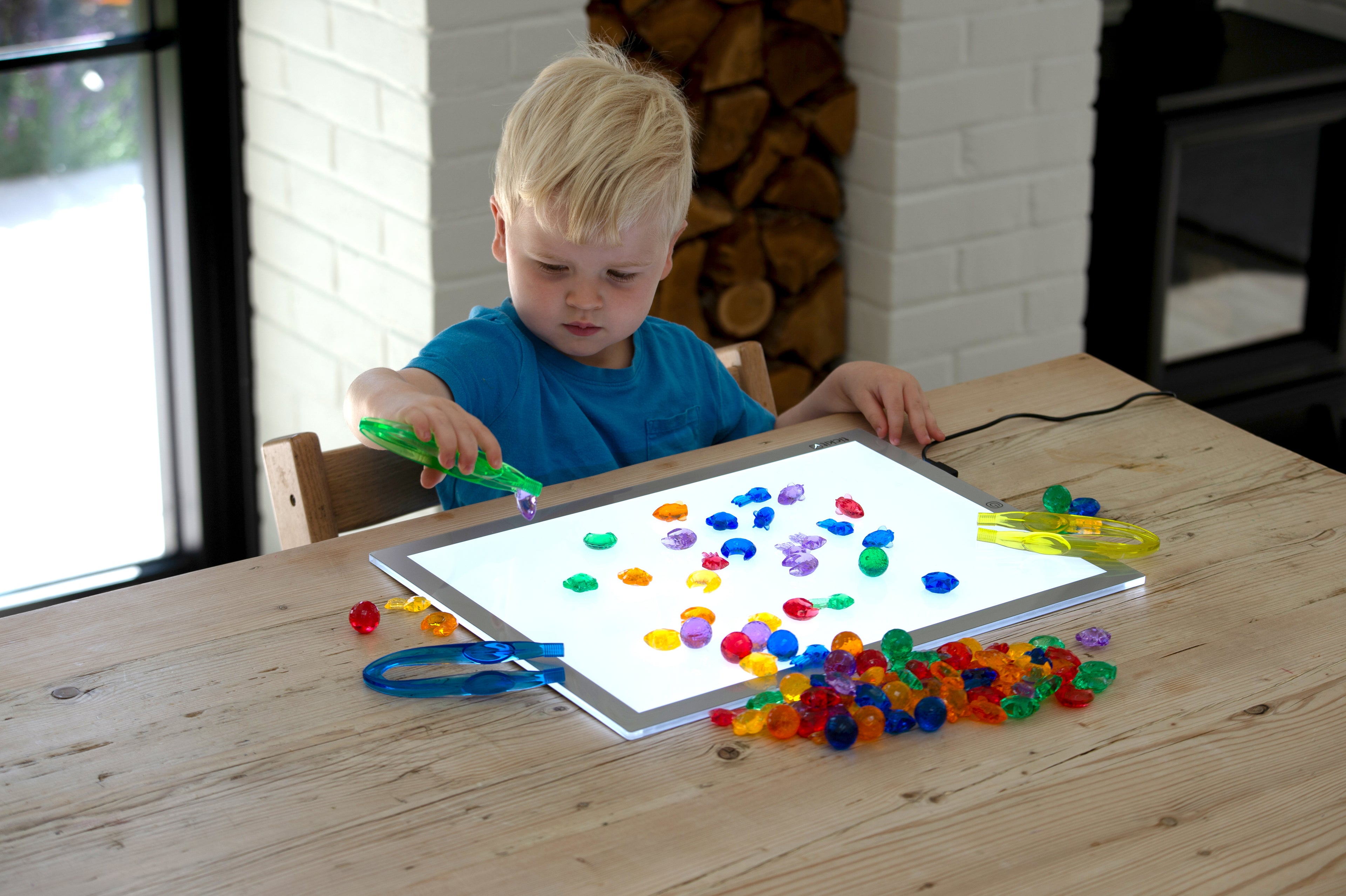 Translucent bead set with flat tray, multicolor scoops, and colorful round beads