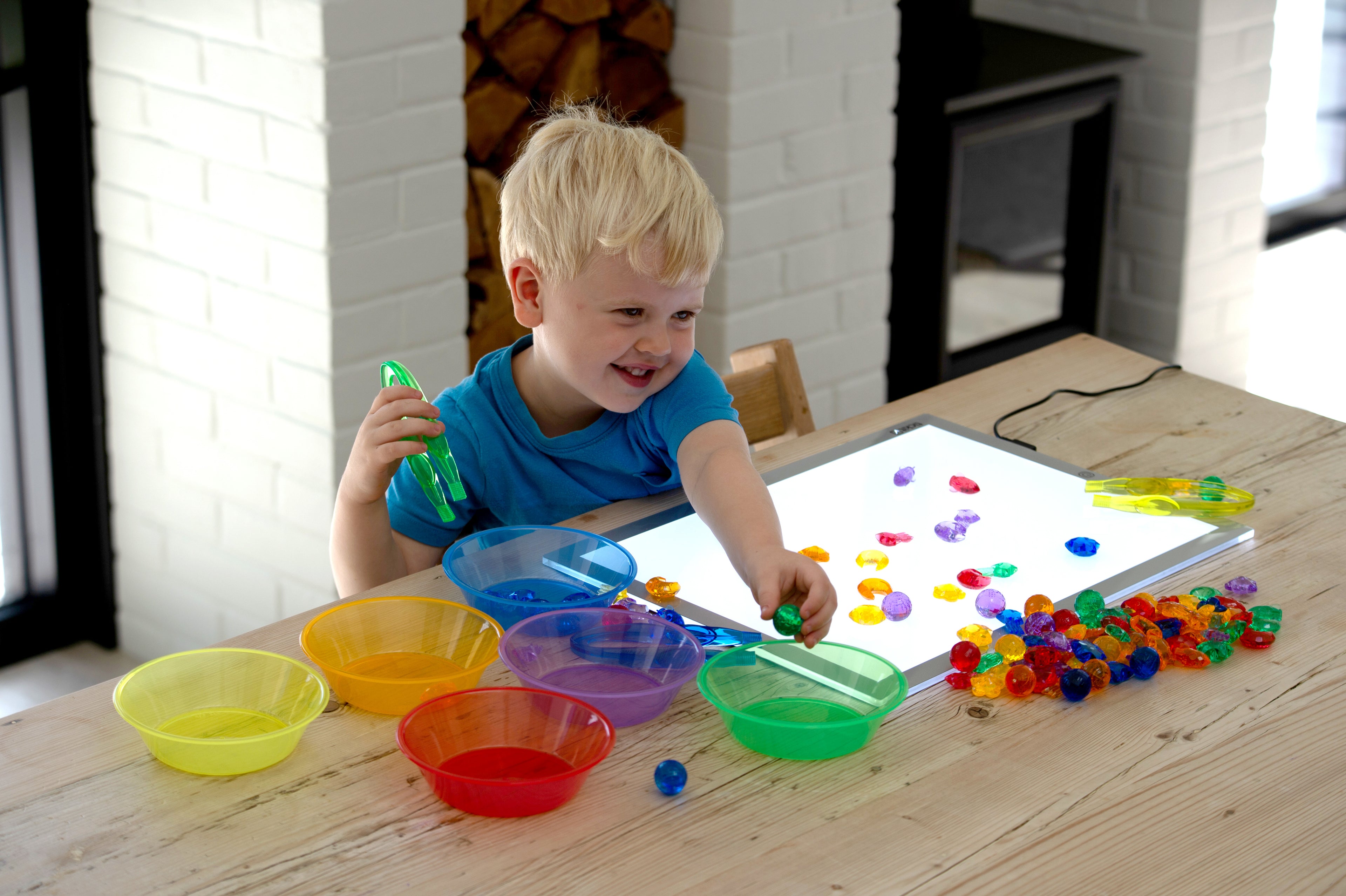 Translucent color bead set with clear tray, colorful bowls, and multicolor beads