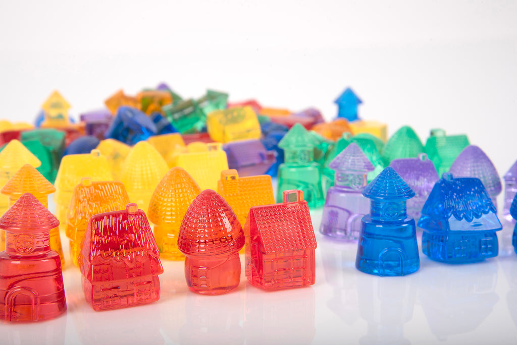 Translucent colored toy houses, assorted red, orange, blue, green, purple pieces