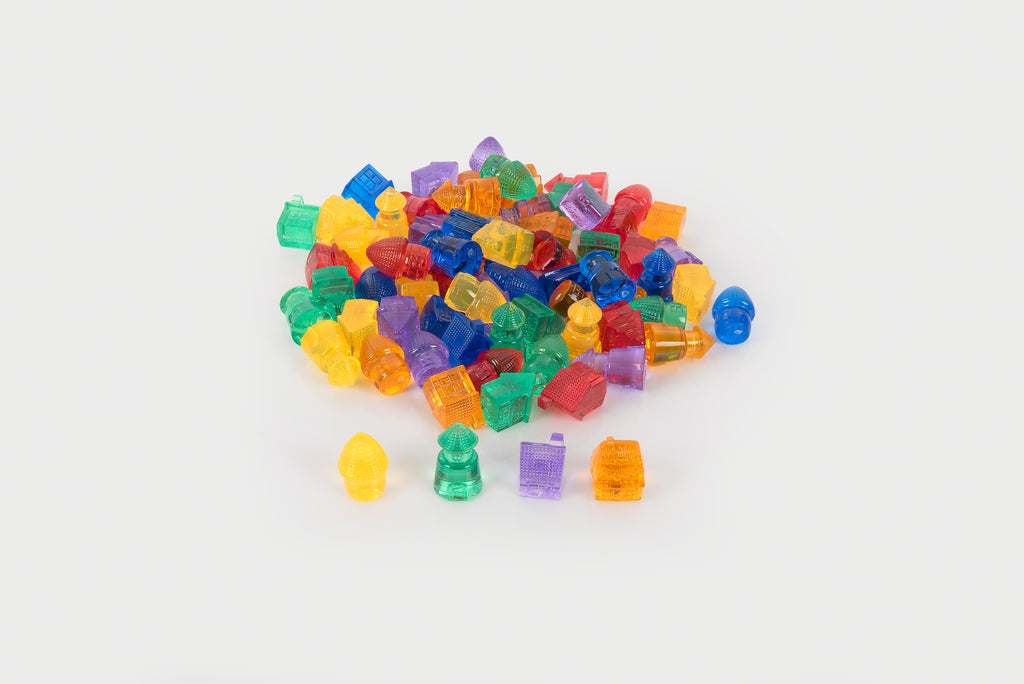 Assorted translucent toy house blocks with small pieces, multicolor