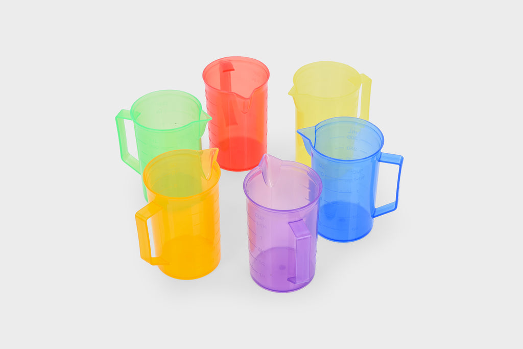 Stack of translucent plastic jugs in red, yellow, green, blue, purple and orange