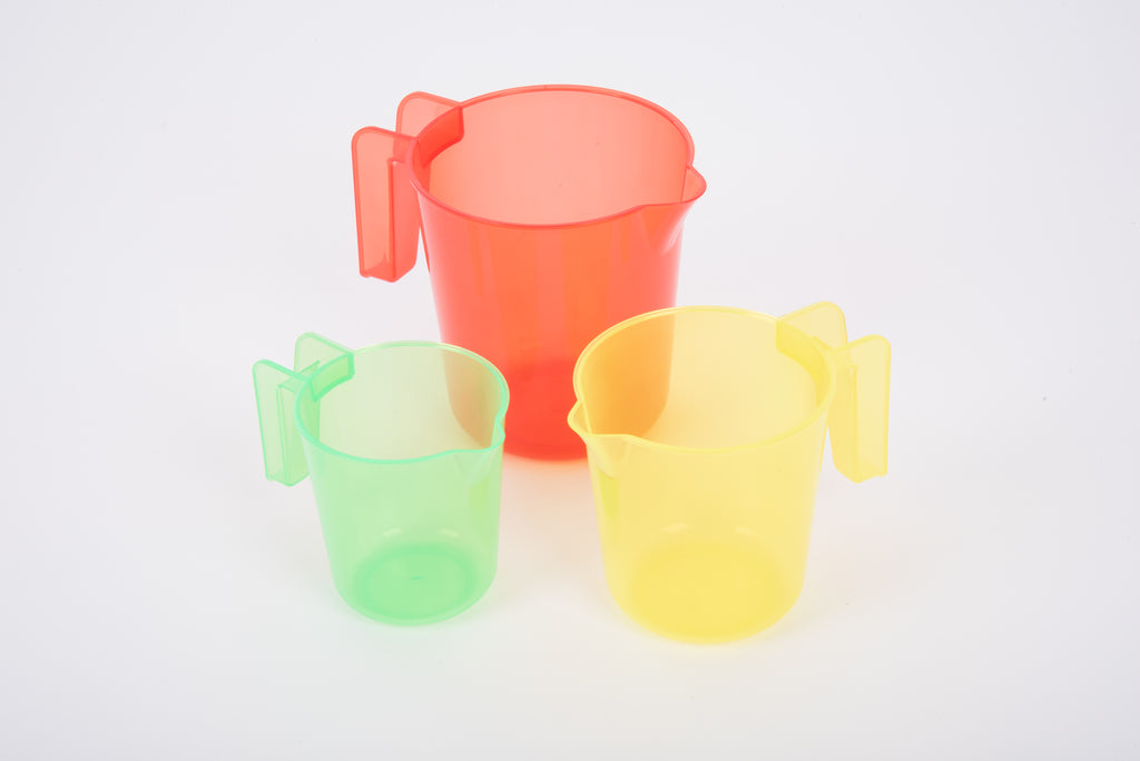Translucent nesting jugs, coral, yellow and mint green cups with handles and spouts
