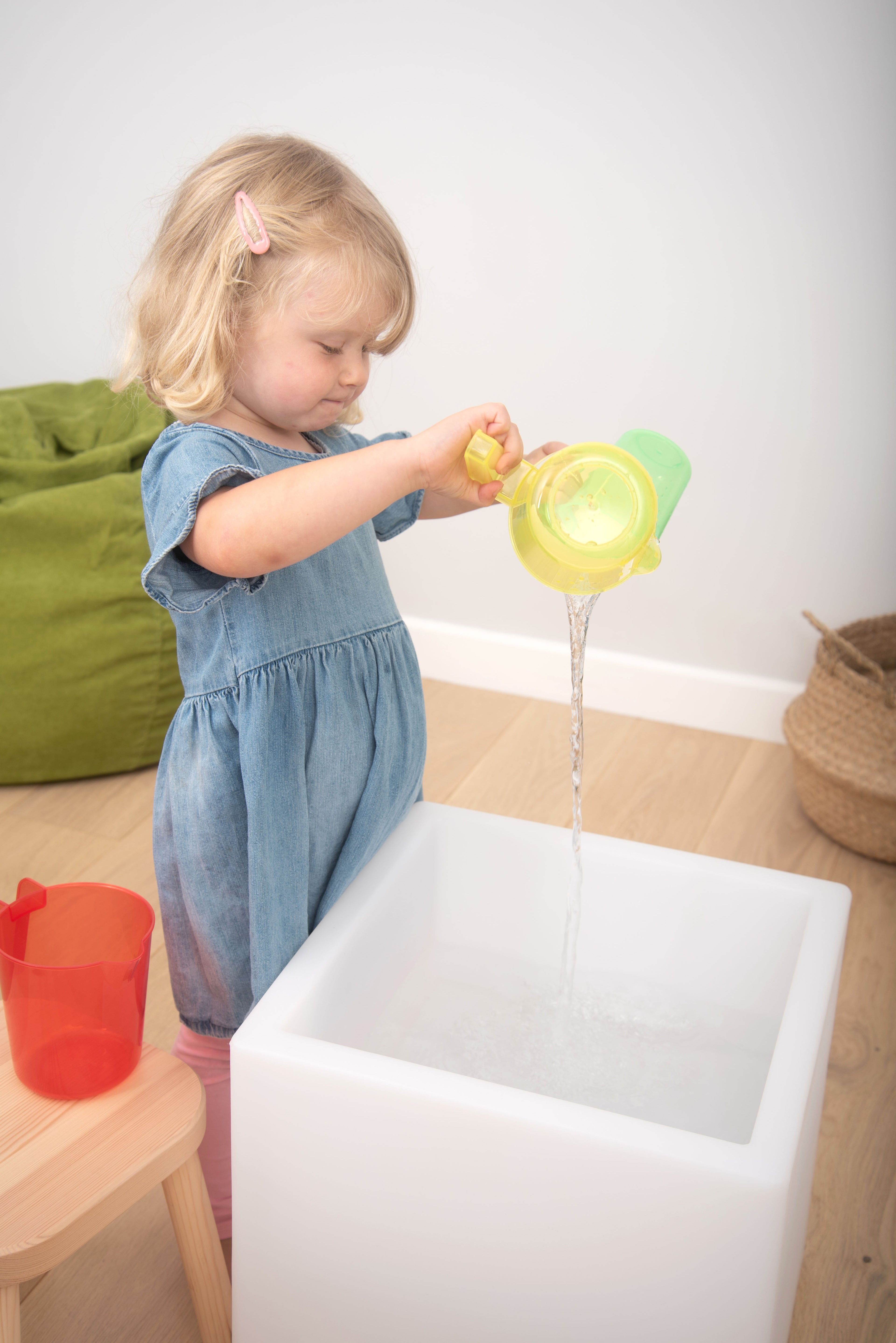 Translucent nesting jug, yellow with green lid, clear pour spout and handle