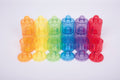 Translucent color pot set, multicolor pots with matching lids arranged in rows